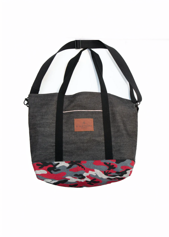 This tote bag is made with a combination of Black Kuroki Selvedge denim from Japan and Cone White Oak Red line Camo Selvedge denim. Made in Canada. Interior and exterior pockets with selvedge detail plus turnback selvedge interior top line finish.
15"x6"x15" (21" across top)