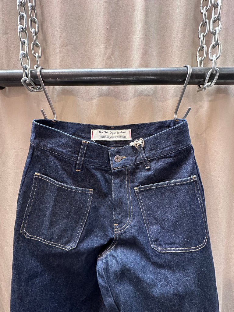 The Brooklyn Denim Co Women's Wide Leg Jean blends vintage-inspired style with modern comfort, offering an effortlessly chic silhouette crafted from premium denim fabric. Designed in Brooklyn and made with meticulous attention to detail, these wide leg jeans sit high on the waist and drape into a relaxed, full-leg shape—perfect for those who appreciate classic style with a contemporary twist.

Cut from soft, durable denim fabric, this pair offers the ideal balance of structure and comfort. 