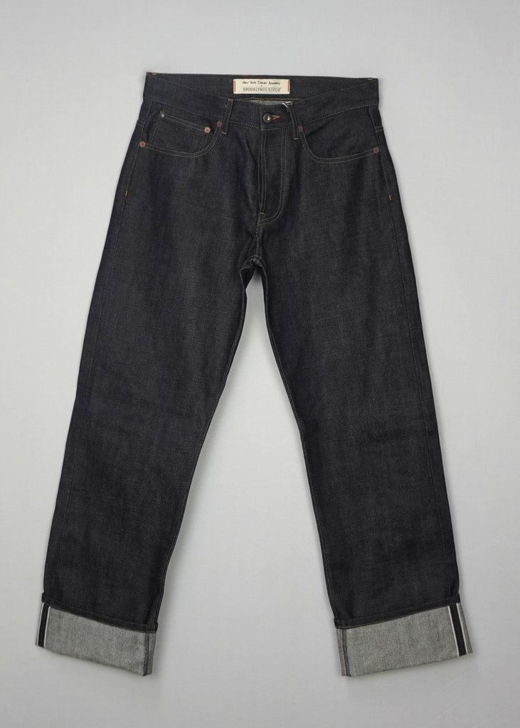 14 oz. Selvedge Denim: Made from premium raw denim that softens and molds to your body over time, ensuring a personalized fit and look.
Relaxed Fit: Provides extra room through the seat and thigh while maintaining a tapered leg for a modern silhouette.
Traditional Selvedge Details: Signature selvedge edge visible at the cuff, showcasing authenticity and superior construction.
Reinforced Durability: Heavy-duty stitching and copper rivets ensure these jeans stand the test of time.