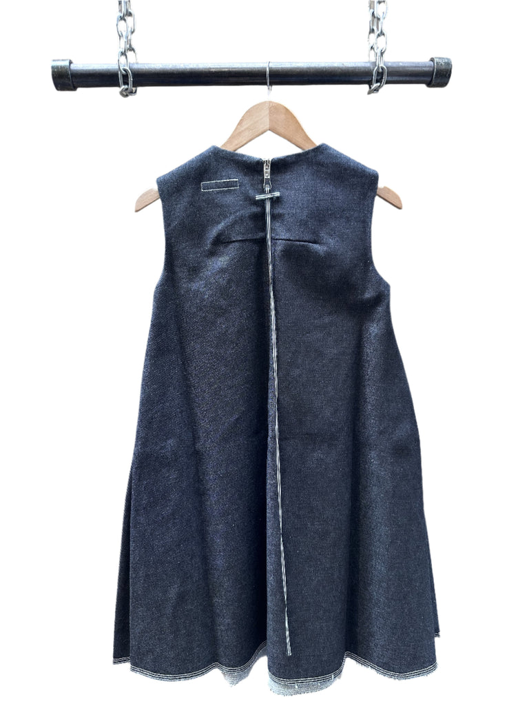 Introducing the February Nora Little Denim Dress, a chic and versatile addition to any wardrobe, available exclusively at Brooklyn Denim Co. This dress exemplifies contemporary fashion with its stylish design and comfortable fit.