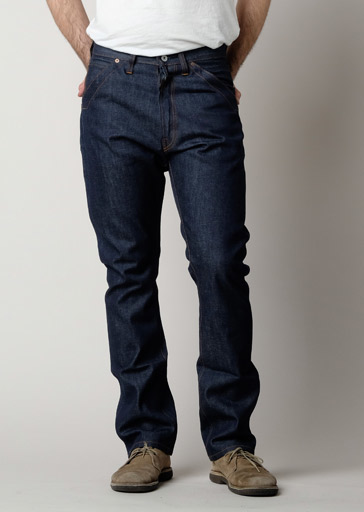 These raw jeans from First Standard Co. feature an adjustable buckle-back waistband, a large top block, tapered legs, slant front pockets, leather patch on the back pocket and a button fly.

Details:

*100% Cotton

*13.5oz Raw Selvage Cone Mills White Oak Denim

*Buckle-Back Waist

*Slant Front Pockets

*Button Fly

*High Rise

*Tapered Leg

*Made in USA