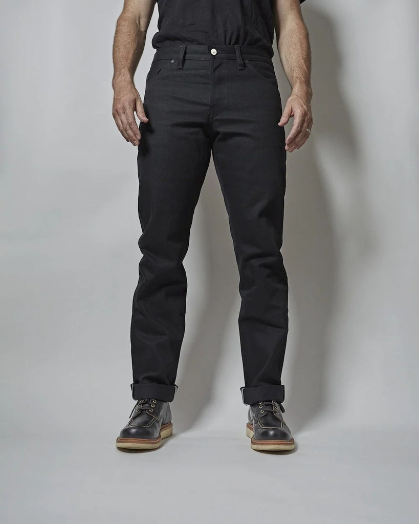 Dark Matter is a medium weight, double black denim with slight slub and a soft hand. It features pure brass "BKLYN" rivets that have been overdyed in black and will create a beautiful shine after months of wear, and black Brooklyn Bridge arcuates on the rear pockets. In the universe dark matter can't be seen, only detected. Let these jeans in your orbit and see who else can't escape their gravitational effects.
- 14oz selvedge denim
- 100% cotton
-Black warp x black weft