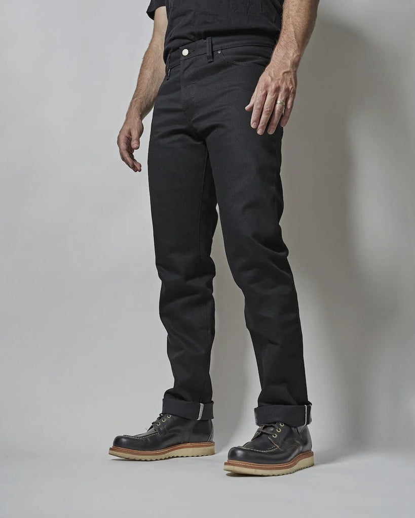 Dark Matter is a medium weight, double black denim with slight slub and a soft hand. It features pure brass "BKLYN" rivets that have been overdyed in black and will create a beautiful shine after months of wear, and black Brooklyn Bridge arcuates on the rear pockets. In the universe dark matter can't be seen, only detected. Let these jeans in your orbit and see who else can't escape their gravitational effects.
- 14oz selvedge denim
- 100% cotton
-Black warp x black weft