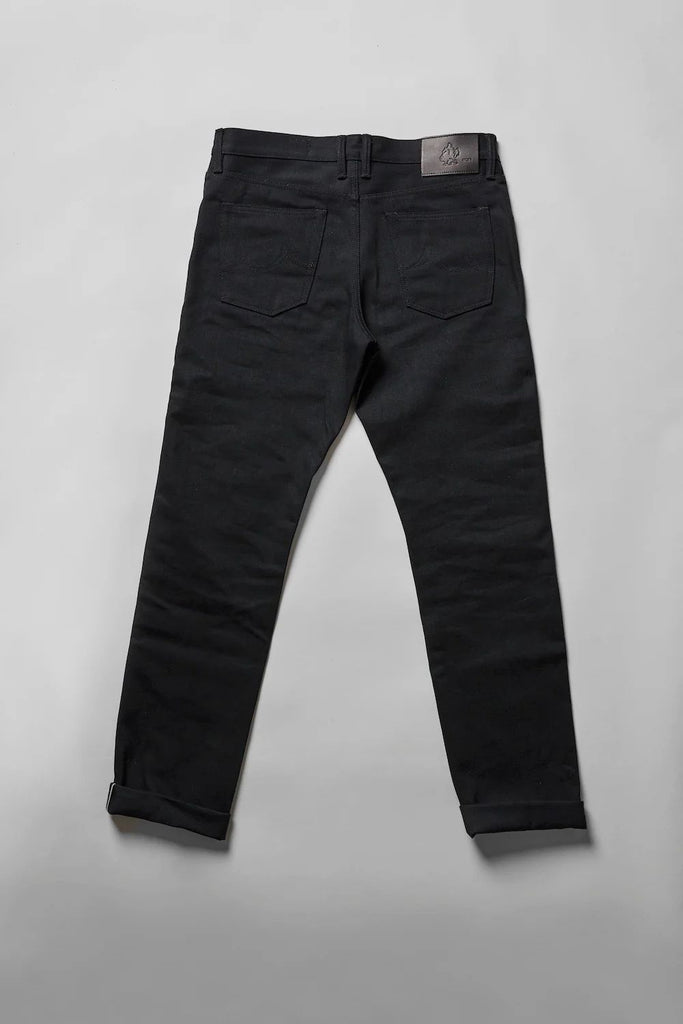 Dark Matter is a medium weight, double black denim with slight slub and a soft hand. It features pure brass "BKLYN" rivets that have been overdyed in black and will create a beautiful shine after months of wear, and black Brooklyn Bridge arcuates on the rear pockets. In the universe dark matter can't be seen, only detected. Let these jeans in your orbit and see who else can't escape their gravitational effects.
- 14oz selvedge denim
- 100% cotton
-Black warp x black weft