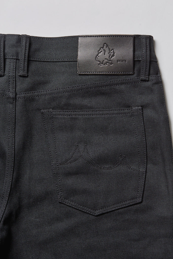 Dark Matter is a medium weight, double black denim with slight slub and a soft hand. It features pure brass "BKLYN" rivets that have been overdyed in black and will create a beautiful shine after months of wear, and black Brooklyn Bridge arcuates on the rear pockets. In the universe dark matter can't be seen, only detected. Let these jeans in your orbit and see who else can't escape their gravitational effects.
- 14oz selvedge denim
- 100% cotton
-Black warp x black weft