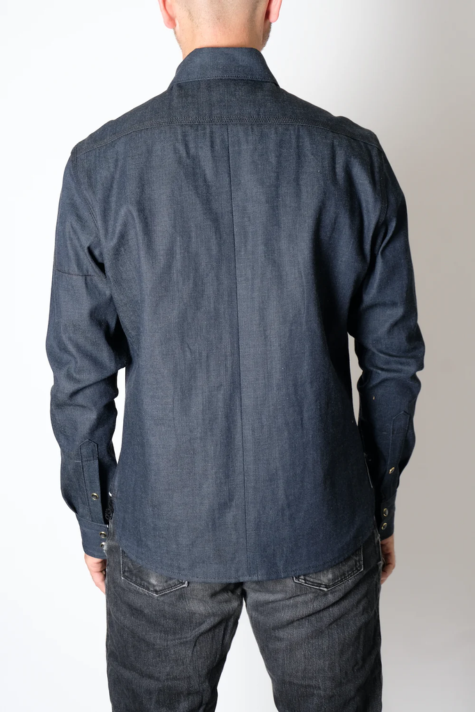 The Fitted Underground Chelsea Selvedge Workshirt is built to endure, combining rugged durability with refined, heritage craftsmanship. Crafted in Brooklyn from heavyweight 11 oz. Japanese selvedge denim fabric, this workshirt offers a perfect balance of structure, comfort, and breathability—making it an essential layering piece for cooler days or a sleek, standalone shirt for year-round wear.