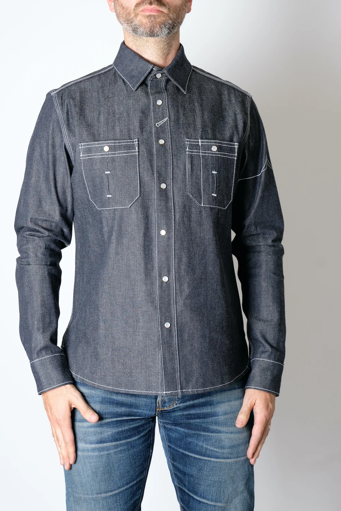 The Fitted Underground Chelsea Selvedge Workshirt is built to endure, combining rugged durability with refined, heritage craftsmanship. Crafted in Brooklyn from heavyweight 11 oz. Japanese selvedge denim fabric, this workshirt offers a perfect balance of structure, comfort, and breathability—making it an essential layering piece for cooler days or a sleek, standalone shirt for year-round wear.