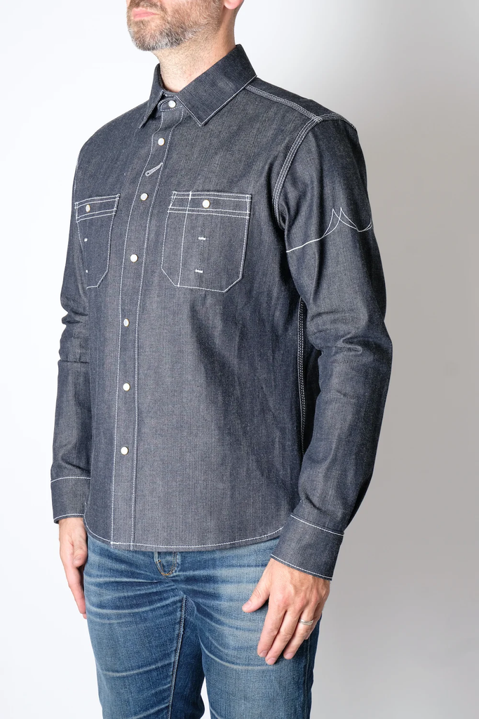 The Fitted Underground Chelsea Selvedge Workshirt is built to endure, combining rugged durability with refined, heritage craftsmanship. Crafted in Brooklyn from heavyweight 11 oz. Japanese selvedge denim fabric, this workshirt offers a perfect balance of structure, comfort, and breathability—making it an essential layering piece for cooler days or a sleek, standalone shirt for year-round wear.