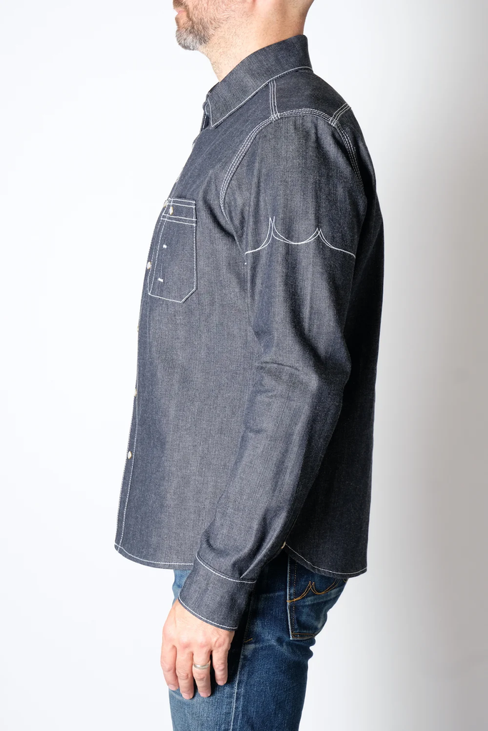 The Fitted Underground Chelsea Selvedge Workshirt is built to endure, combining rugged durability with refined, heritage craftsmanship. Crafted in Brooklyn from heavyweight 11 oz. Japanese selvedge denim fabric, this workshirt offers a perfect balance of structure, comfort, and breathability—making it an essential layering piece for cooler days or a sleek, standalone shirt for year-round wear.