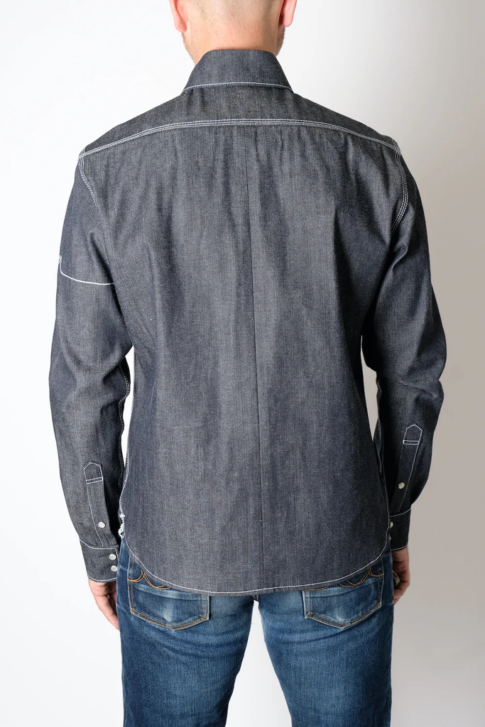The Fitted Underground Chelsea Selvedge Workshirt is built to endure, combining rugged durability with refined, heritage craftsmanship. Crafted in Brooklyn from heavyweight 11 oz. Japanese selvedge denim fabric, this workshirt offers a perfect balance of structure, comfort, and breathability—making it an essential layering piece for cooler days or a sleek, standalone shirt for year-round wear.