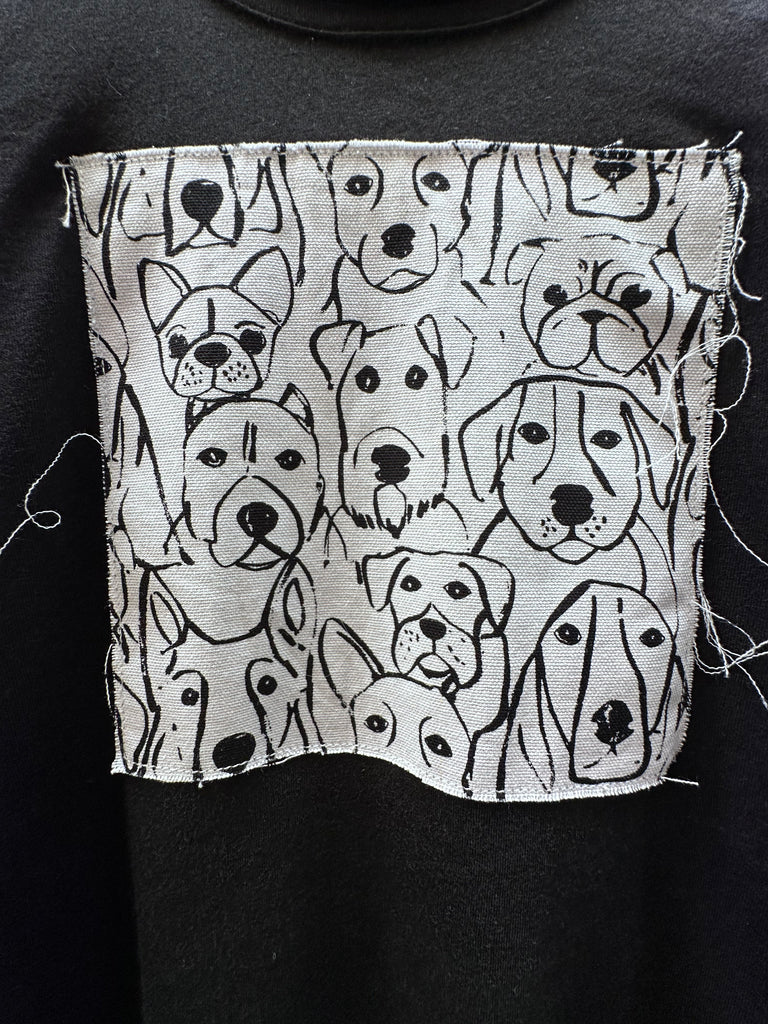 The NY Denim Academy Patch Dog Tee fuses streetwear cool with playful charm, offering a standout essential for casual, creative dressing. Crafted from premium soft cotton, this relaxed-fit tee features a unique embroidered dog patch on the chest—adding a bold touch of personality that channels downtown NYC attitude.

Designed for versatile styling, this tee wears effortlessly with your favorite denim or layered under a blazer and jeans for a polished, off-duty look. 
