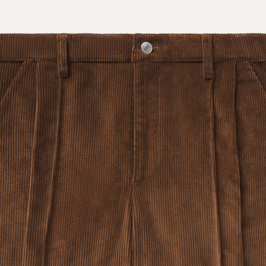 Corduroy wide leg pants
Made in Los Angeles
Single pleat
Pin tuck
Embroidered waistband featuring "yony" script logo
Brass tack button closure on waistband
Back triangular welt pockets with brass tack button closure
Fabric: 100% cotton | Made in Italy
Pocket Lining: 100% cotton | Made in USA
Zipper: YKK  | Made in USA

Dry clean only