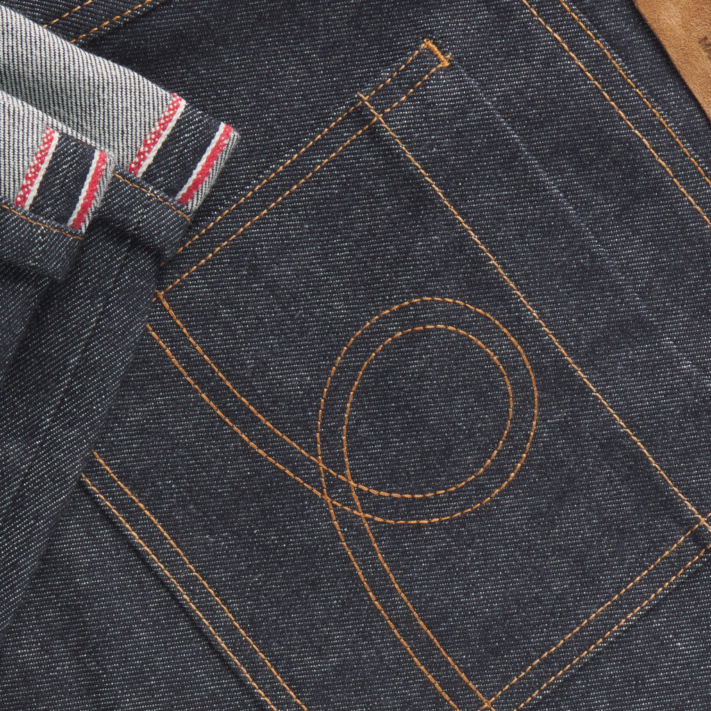 Five pocket raw denim jeans
Made in Los Angeles
Real leather debossed patch
Signature loop embroidered back patch pockets
Silver tack button closure on waistband
Fabric: 100% organic cotton | Grown and Woven in USA
Buttons and rivets: Made in Italy
Pocket lining: 100% cotton | Made in USA
Zipper: YKK | Made in USA
Patch: 100% leather | Made in Italy
