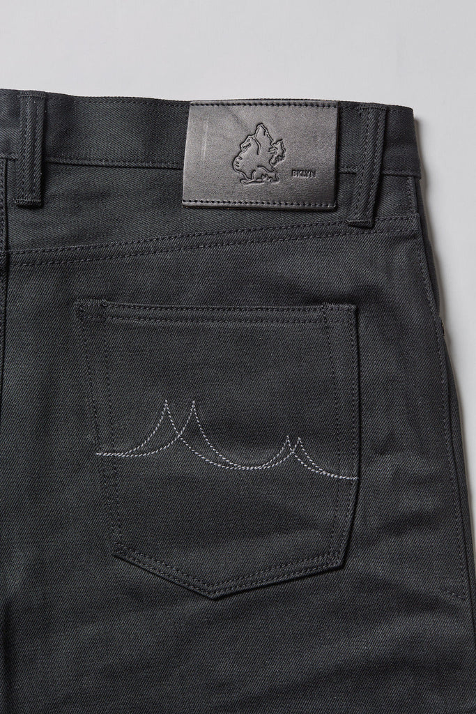 DENIM
Standard Issue 2xB is the same composition as the Standard Issue, in a double black denim. Slight stretch to keep you comfortable throughout the day, a soft hand and a jet black exterior that begins with a slight sheen that will fade and soften with wear. This is well behaved selvedge from day one that only gets better with wear.
- 13.5oz selvedge denim
- 96/4% cotton/poly
-Black warp x black weft
- Right hand twill
- Collect Mills in Okayama, Japan