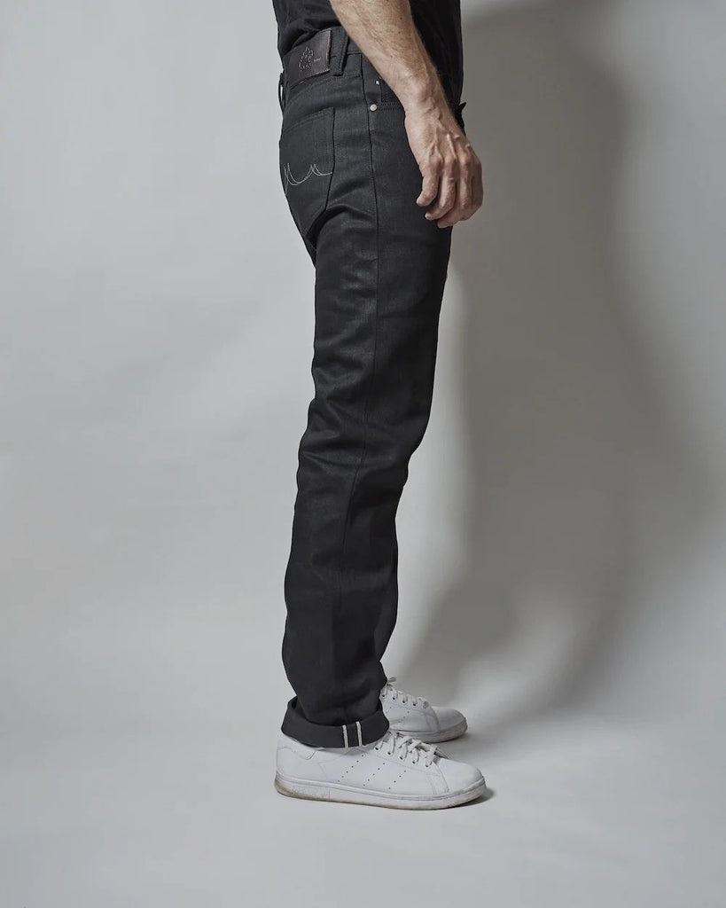 DENIM
Standard Issue 2xB is the same composition as the Standard Issue, in a double black denim. Slight stretch to keep you comfortable throughout the day, a soft hand and a jet black exterior that begins with a slight sheen that will fade and soften with wear. This is well behaved selvedge from day one that only gets better with wear.
- 13.5oz selvedge denim
- 96/4% cotton/poly
-Black warp x black weft
- Right hand twill
- Collect Mills in Okayama, Japan