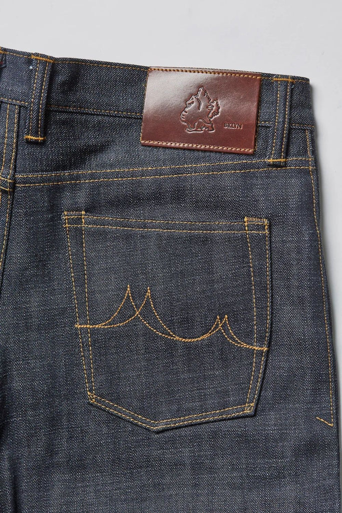 Masterpiece Denim (MPD) is our flagship fabric made of a heavy weight dark indigo Japanese selvedge denim with exceptional character and high fade potential. It has a slubby, textured surface that starts out rigid and breaks in beautifully with wear.
- 16oz selvedge denim
- 100% cotton
- Dark indigo warp x white weft
- Right hand twill
- Collect Mills in Okayama, Japan