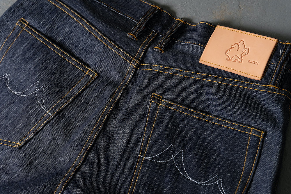 The W13 1968 is made from a beautiful 13oz classic indigo from Cone Mills White Oak factory in Greensboro, North Carolina. Their "1968" denim is tried, true, and loved for generations, but this is a dead stock fabric as the looms were shut off for the final time in December, 2017.

The Wythe cut itself is heavily influenced leading men of the 1950s. It has a high rise with a relaxed straight leg. It's classically designed but infused with modern styling. 