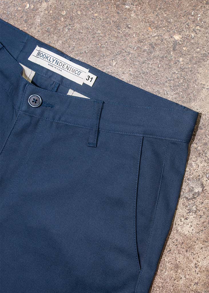 Our men's chinos are pants made in the USA of 100% cotton. They feature a slimming fit throughout the leg with side pockets and slit back pockets.

Customize the fit with complimentary hemming.

100% Cotton
Slim Fit
Zipper Fly
Made in USA
Colors: Sand, Black, Jalapeño & Navy