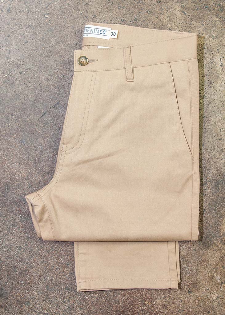 Our men's chinos are pants made in the USA of 100% cotton. They feature a slimming fit throughout the leg with side pockets and slit back pockets.

Customize the fit with complimentary hemming.

100% Cotton
Slim Fit
Zipper Fly
Made in USA
Colors: Sand, Black, Jalapeño & Navy
