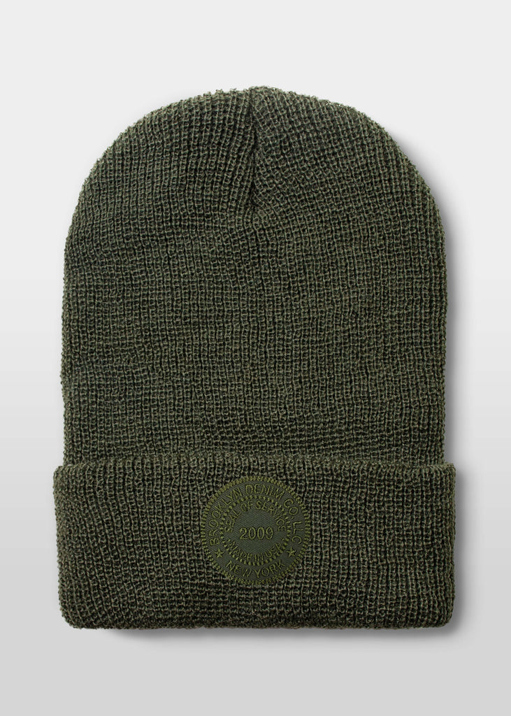 Introducing the Brooklyn Denim Co. Embroidered Seal Beanie in Green, a premium accessory that combines warmth, style, and quality craftsmanship.

Key Features:

    100% Wool Construction: Expertly crafted from high-quality wool, this beanie offers superior warmth and comfort, making it an ideal choice for cooler weather.

    Embroidered Seal Design: Featuring Brooklyn Denim Co.'s signature embroidered seal, this beanie adds a touch of distinctive style to your ensemble.