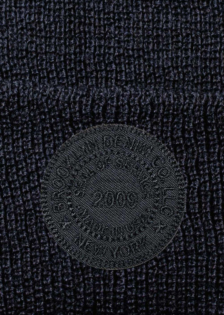 Introducing the Brooklyn Denim Co. Embroidered Seal Beanie in Black, a premium accessory that combines warmth, style, and quality craftsmanship.

Key Features:

    100% Wool Construction: Expertly crafted from high-quality wool, this beanie offers superior warmth and comfort, making it an ideal choice for cooler weather.

    Embroidered Seal Design: Featuring Brooklyn Denim Co.'s signature embroidered seal, this beanie adds a touch of distinctive style to your ensemble.