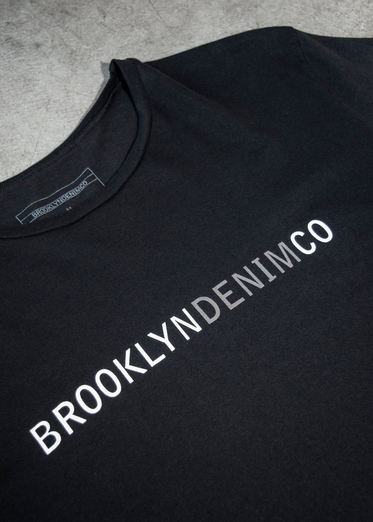 The Brooklyn Denim Co. Organic Cotton Logo Tee is a testament to quality and simplicity, offering a super soft, short sleeve crew neck design that seamlessly integrates into any wardrobe. Crafted from 100% organic cotton, this pre-shrunk, tagless tee ensures maximum comfort and durability. Proudly made in the USA, it features the distinctive Brooklyn Denim Co. logo, making it a staple for those who appreciate sustainable fashion and timeless design.
100% Organic Cotton