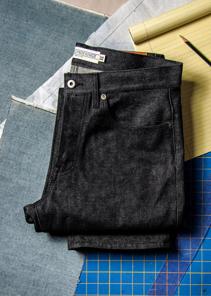 Brooklyn Denim Co's Men's Relaxed Jeans are a company favorite. This jean is a classic 5-pocket with a roomy fit. The Relaxed cut is wide in the thigh and tapers through the bottom of the leg. This go-around, we made it in a mid-weight unwashed classic 3x1 denim.

100% Cotton
12.75 oz Rigid Black Denim w/Natural Fill

Fit: Relaxed
Rise: Mid
Leg: Wide through thigh with a slight taper to the bottom
Button Fly
Contrast Stitching
Made in New York