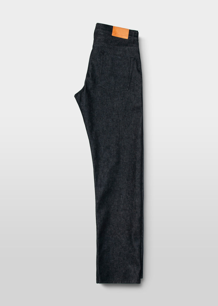 Brooklyn Denim Co's Men's Relaxed Jeans are a company favorite. This jean is a classic 5-pocket with a roomy fit. The Relaxed cut is wide in the thigh and tapers through the bottom of the leg. This go-around, we made it in a mid-weight unwashed classic 3x1 denim.

100% Cotton
12.75 oz Rigid Black Denim w/Natural Fill

Fit: Relaxed
Rise: Mid
Leg: Wide through thigh with a slight taper to the bottom
Button Fly
Contrast Stitching
Made in New York