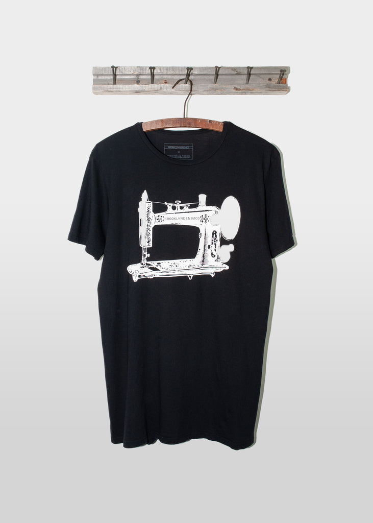 

This Brooklyn Denim Co. features a vintage Singer machine graphic screen printed on a super soft short sleeve tee with a crew neckline.

Details:

*100% organic cotton

*Pre-Shrunk

*No tag

*Made in USA