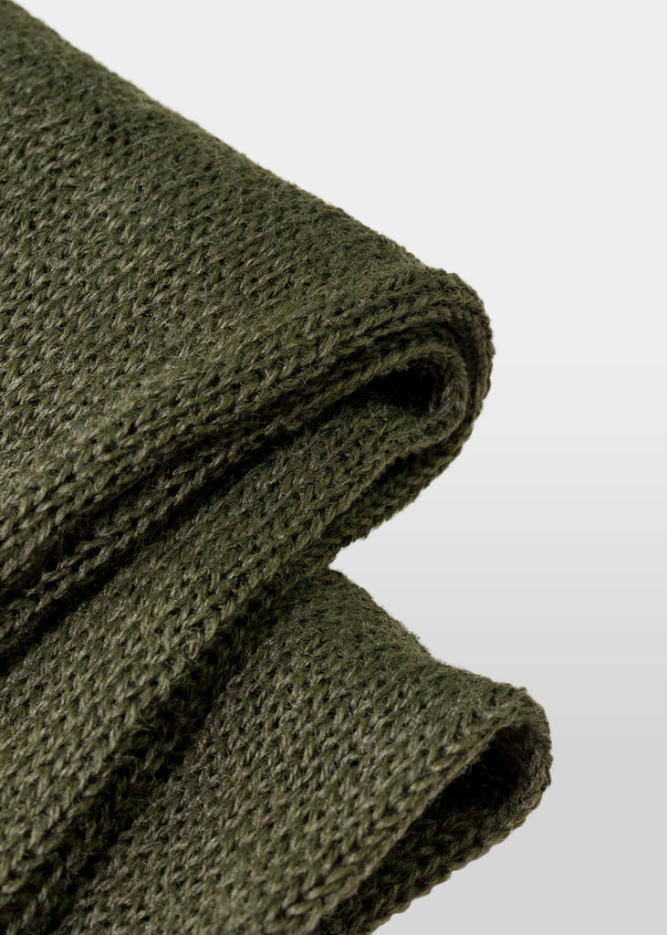 Made from 100% wool, this Brooklyn Denim Co. knit scarf has an updated vintage military deadstock vibe. This scarf features the Brooklyn Denim Co. seal logo, screen printed in white. Keep warm this winter in Brooklyn Denim Co merch! Available in black and olive.

100% wool

Screen printed seal logo
One size fits all