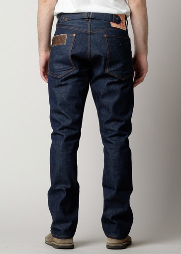 These raw jeans from First Standard Co. feature an adjustable buckle-back waistband, a large top block, tapered legs, slant front pockets, leather patch on the back pocket and a button fly.

Details:

*100% Cotton

*13.5oz Raw Selvage Cone Mills White Oak Denim

*Buckle-Back Waist

*Slant Front Pockets

*Button Fly

*High Rise

*Tapered Leg

*Made in USA