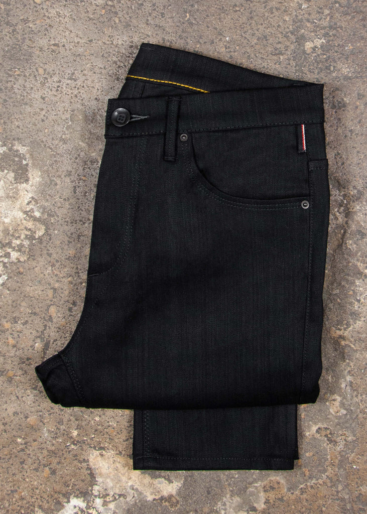 Vintage weave "STAY BLACK" black/black denim. This coveted fabric will truly fade 2 times slower than other black/black denim on the market.

Runs 2 sizes larger than normal.

Fit : mid rise, slim taper. Not skinny.
Fabric : 11oz Black warp with a Black weft
62% cotton 33% modal 2% eme 3% lycra
Finish : Dry and unwashed
Will shrink 2” if laundered and dried. Just the nature of the fabric.