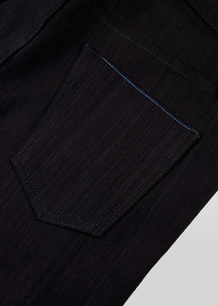 Vintage weave "STAY BLACK" black/black denim. This coveted fabric will truly fade 2 times slower than other black/black denim on the market.

Runs 2 sizes larger than normal.

Fit : mid rise, slim taper. Not skinny.
Fabric : 11oz Black warp with a Black weft
62% cotton 33% modal 2% eme 3% lycra
Finish : Dry and unwashed
Will shrink 2” if laundered and dried. Just the nature of the fabric.