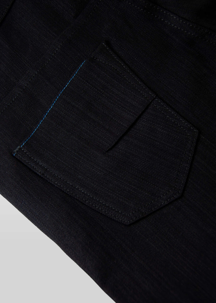 Vintage weave "STAY BLACK" black/black denim. This coveted fabric will truly fade 2 times slower than other black/black denim on the market.

Runs 2 sizes larger than normal.

Fit : mid rise, slim taper. Not skinny.
Fabric : 11oz Black warp with a Black weft
62% cotton 33% modal 2% eme 3% lycra
Finish : Dry and unwashed
Will shrink 2” if laundered and dried. Just the nature of the fabric.