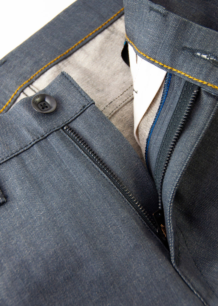 This is the grey version of Matias' proprietary RUNN fabric from Candiani Mills in Milan!

Hence, this sleek, flat fabric is only available to us!

Runs 2 sizes larger than normal.

Fit : mid rise, slim taper. Not skinny.
Fabric : 11oz Grey sulfur dyed warp with a natural weft Candiani 98% cotton ; 2% elastane NON SELVAGE
Finish : resin coated 
