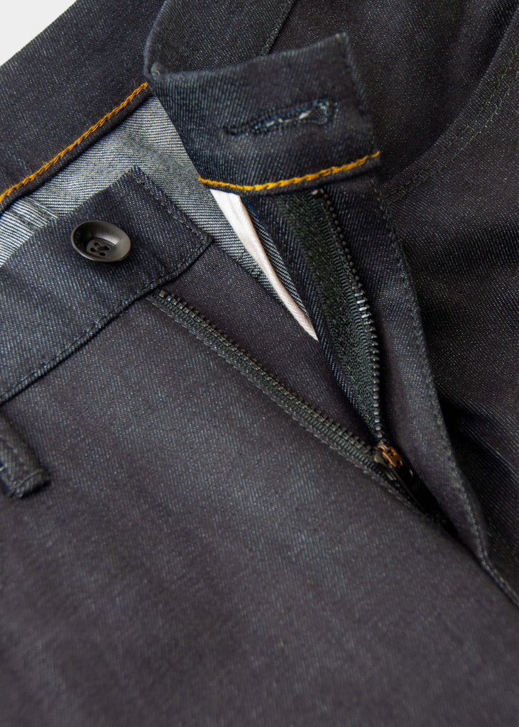 "Think of it as a great start to a “new-vintage” pair of jeans...I digress.. they’re fu*ing cool and unlike anything else you’ll ever find." A more classic fit from an avant-garde designer, this jean has all of the nuanced detailing that you crave from Matias. These jeans are anything but ordinary, the piece that you will obsess over for years to come!

Mid rise
Slim taper. Not skinny.
11oz indigo warp with a natural weft Candiani 98% cotton ; 2% elastane
Resin coated
Unwashed
14.5" L