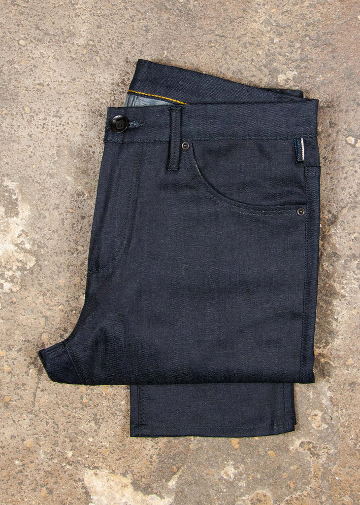 "Think of it as a great start to a “new-vintage” pair of jeans...I digress.. they’re fu*ing cool and unlike anything else you’ll ever find." A more classic fit from an avant-garde designer, this jean has all of the nuanced detailing that you crave from Matias. These jeans are anything but ordinary, the piece that you will obsess over for years to come!

Mid rise
Slim taper. Not skinny.
11oz indigo warp with a natural weft Candiani 98% cotton ; 2% elastane
Resin coated
Unwashed
14.5" L