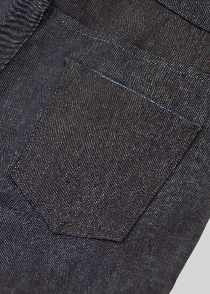 "Think of it as a great start to a “new-vintage” pair of jeans...I digress.. they’re fu*ing cool and unlike anything else you’ll ever find." A more classic fit from an avant-garde designer, this jean has all of the nuanced detailing that you crave from Matias. These jeans are anything but ordinary, the piece that you will obsess over for years to come!

Mid rise
Slim taper. Not skinny.
11oz indigo warp with a natural weft Candiani 98% cotton ; 2% elastane
Resin coated
Unwashed
14.5" L