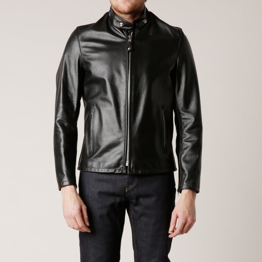 This lightweight leather jacket features the vintage cafe racer fit with satin lining and a zip front closures with two side pockets.

Details:

*Waxy Cowhide

*26" length

*Union made in the U.S.A

Schott NYC jackets have become a symbol of American culture, growing and changing as America does, defining everything they do and every jacket they make. 