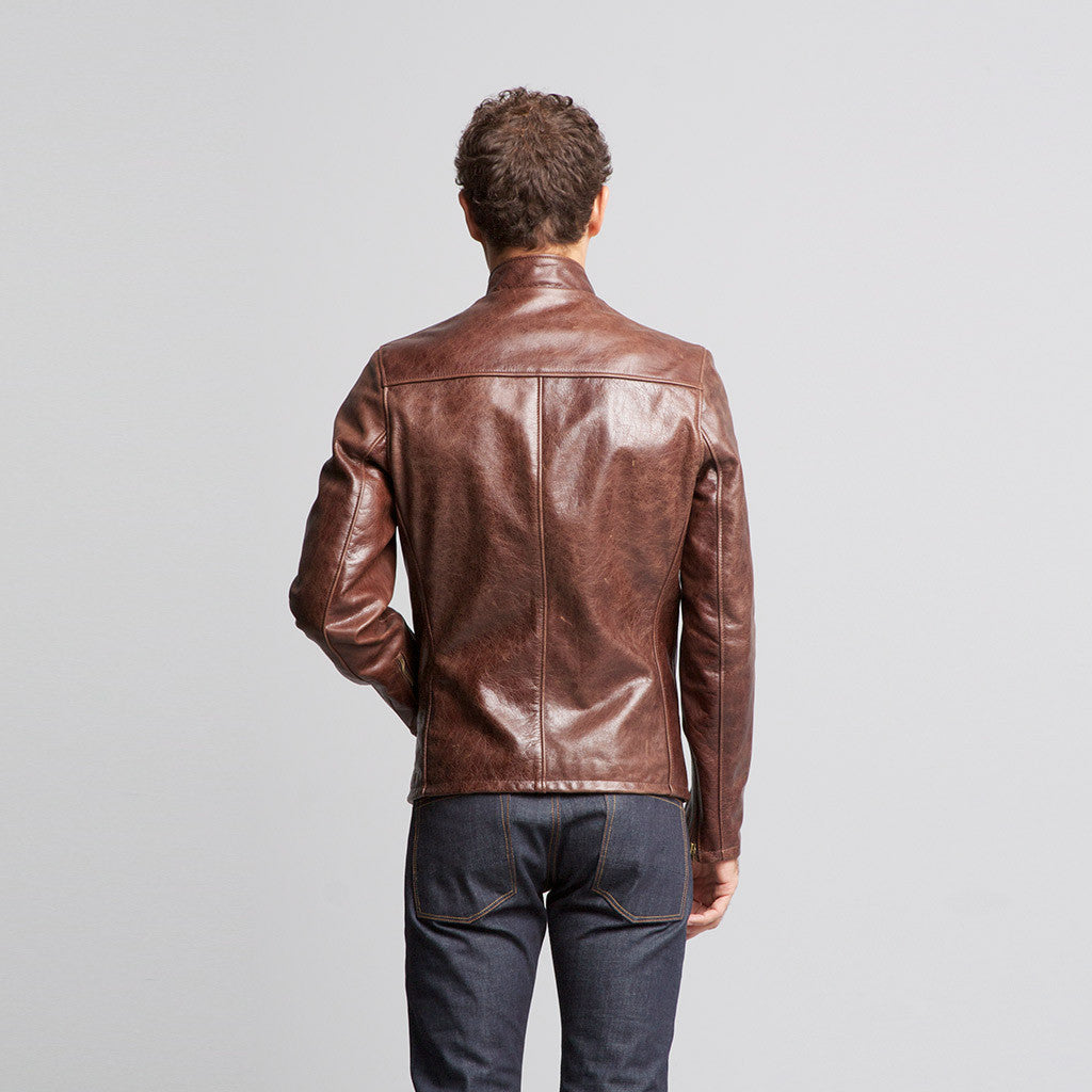 This lightweight leather jacket features the vintage cafe racer fit with satin lining and a zip front closures with two side pockets.

Details:

*Waxy Cowhide

*26" length

*Union made in the U.S.A

Schott NYC jackets have become a symbol of American culture, growing and changing as America does, defining everything they do and every jacket they make. 