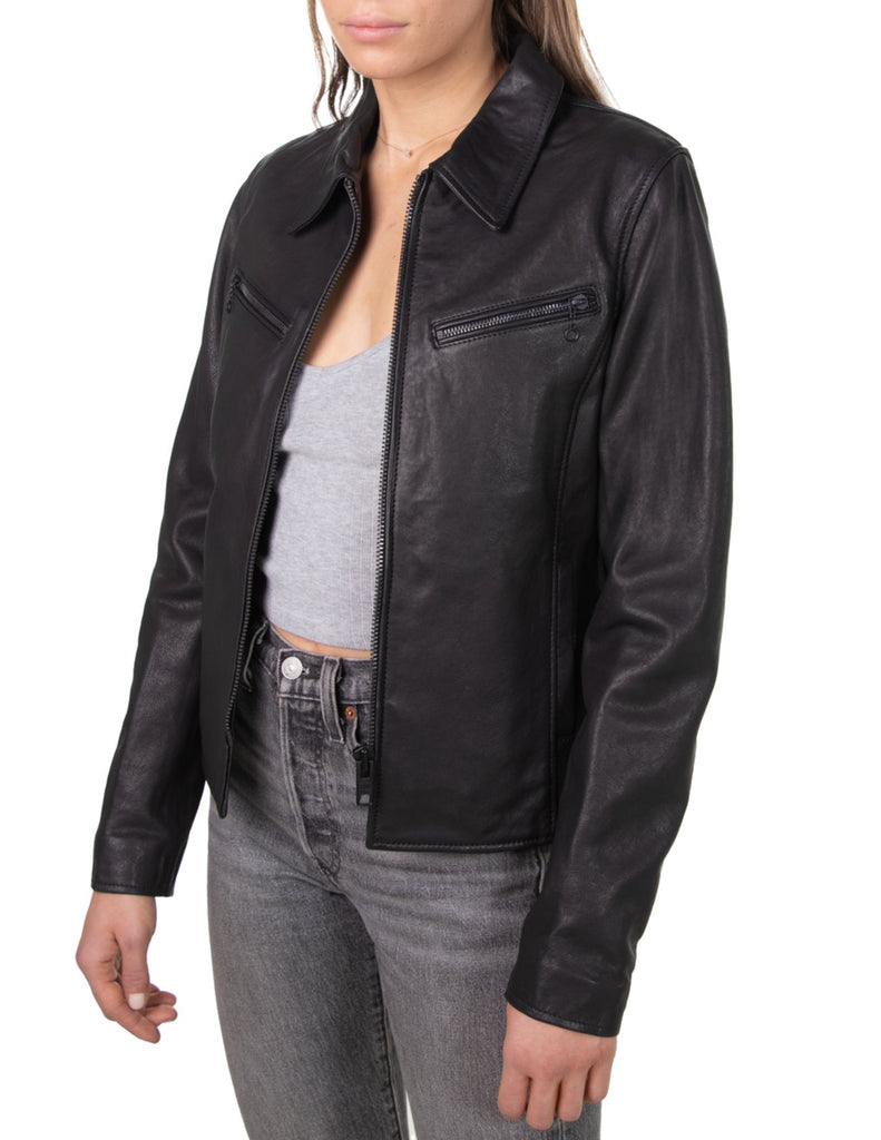 A time honored style that is always stylish. This women's Schott classic leather jacket features two zippered pockets and a front zip closure in tonal matte black metal. Constructed from soft lambskin, this jacket is clean and timeless.

22.5" Length

Two Lower Front Welt Pockets

Two Zipper Chest Pockets

Matte Black Trim

Black Satin Lining

Imported