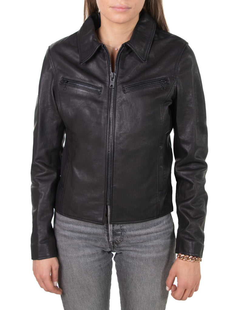 A time honored style that is always stylish. This women's Schott classic leather jacket features two zippered pockets and a front zip closure in tonal matte black metal. Constructed from soft lambskin, this jacket is clean and timeless.

22.5" Length

Two Lower Front Welt Pockets

Two Zipper Chest Pockets

Matte Black Trim

Black Satin Lining

Imported